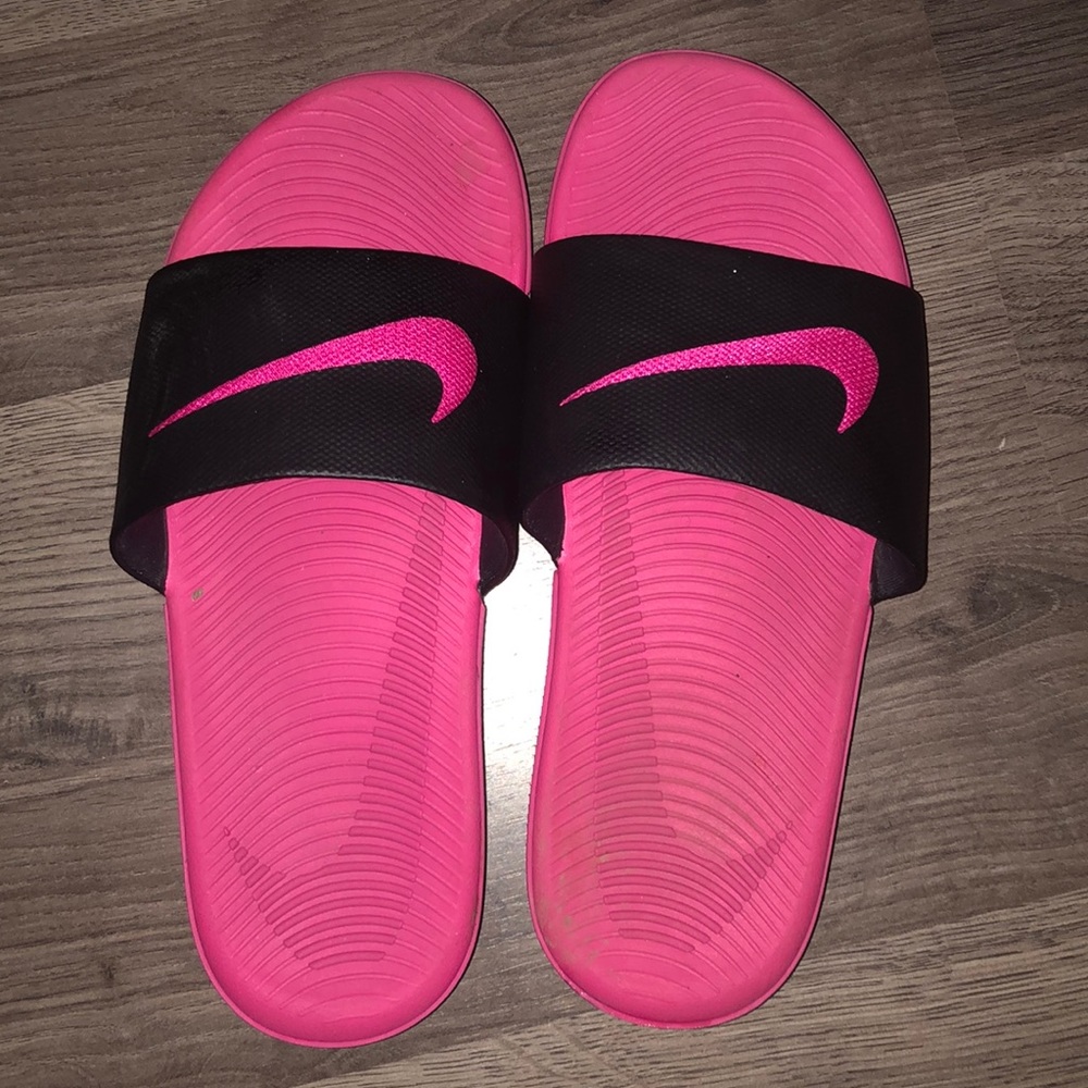 Pink and black Nike Slides